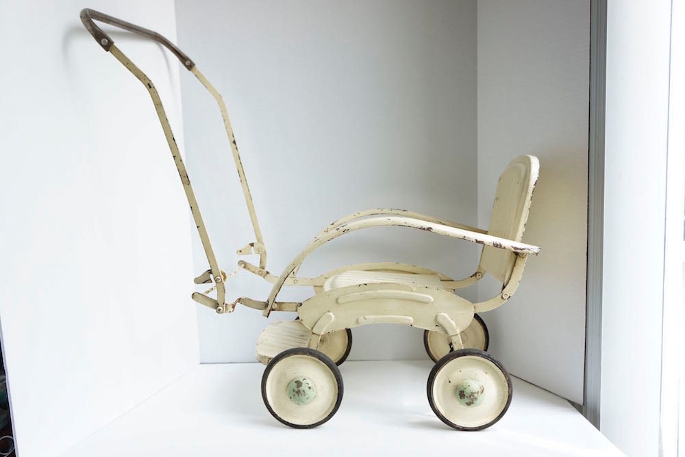 Antique shop metal stroller