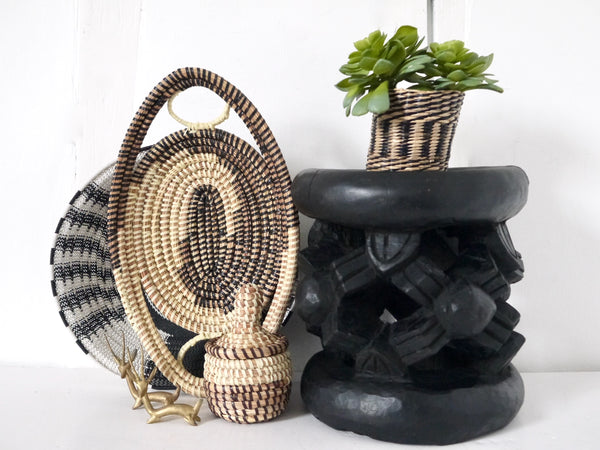 Vintage African black wooden ethnic stool