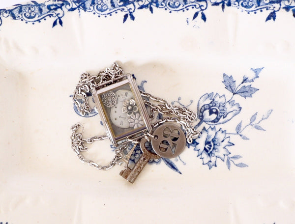 French Vintage Necklace watchcase with key and eiffel tower and number 28 tag wristwatch bezel assemblage