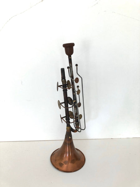 Vintage folk art trombone